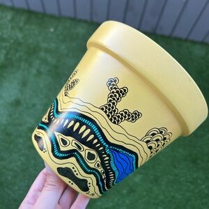 Hand-Painted Yellow Decorative Flower Pot with Blue and Black Accents